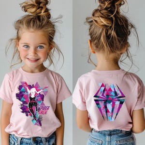 May include: Pink t-shirt featuring a graphic of Spider-Gwen in a dynamic pose, with a geometric background in shades of purple, teal, and white. The text "Spider Gwen" is printed below the character. The back of the shirt displays a geometric spider emblem.