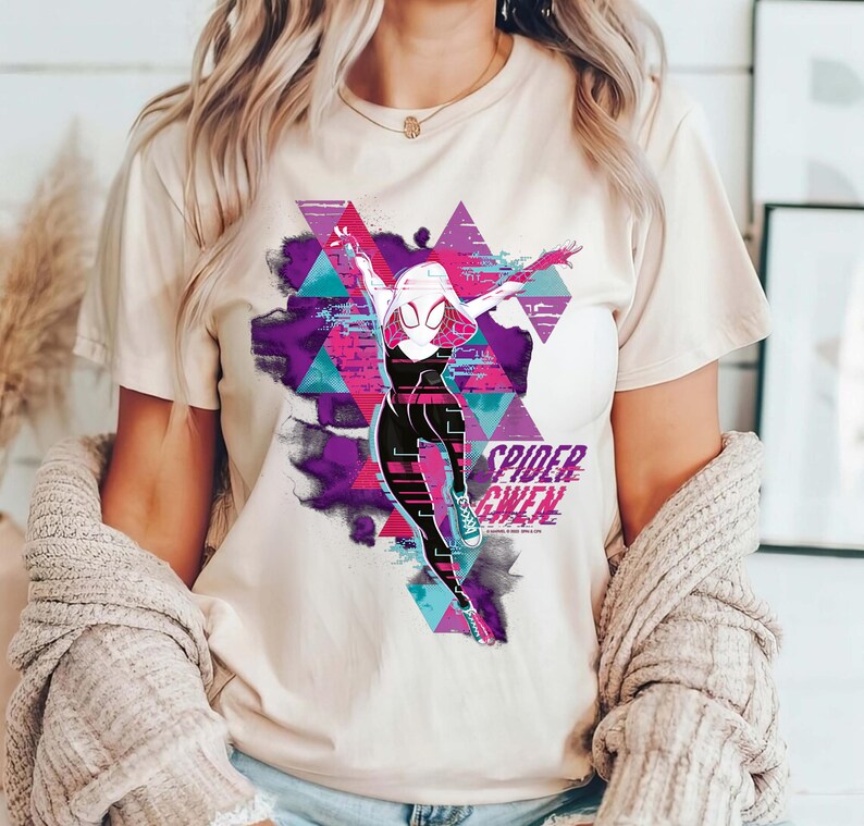 May include: A set of three ceramic mugs with a speckled, matte finish. The mugs are in shades of cream, light gray, and dark gray. Each mug has a simple, minimalist design and a rounded handle.