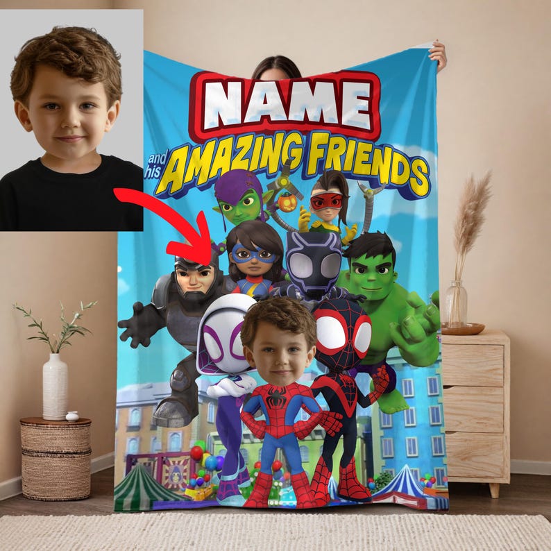 May include: A personalized blue blanket featuring the text "NAME and his AMAZING FRIENDS" with cartoon superhero characters. The blanket has a photo of a child's face in the center, with a red arrow pointing to the superhero characters.