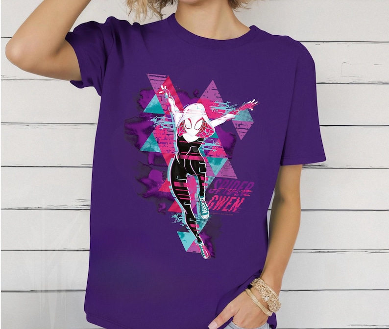 May include: A white ceramic mug with a black handle and the text "But First, Coffee" in a bold, black font. The mug is sitting on a wooden surface. The mug is approximately 4 inches tall.