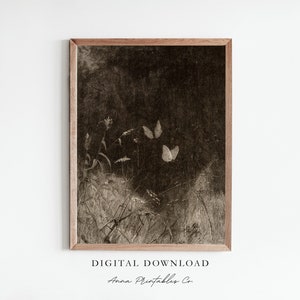May include: Sepia-toned framed print featuring a field of tall grass and wildflowers with two butterflies. The artwork has a vintage aesthetic. The text "DIGITAL DOWNLOAD" and "Anna Printables Co." are at the bottom.