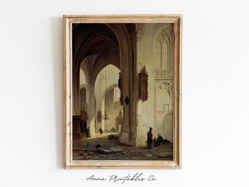 May include: A painting of the interior of a church with high vaulted ceilings and stone pillars. The church is empty except for a few people in the distance. The painting is framed in a wooden frame.