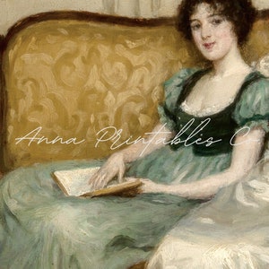 May include: A woman in a green dress with a black bodice sits on a gold patterned couch and reads a book.