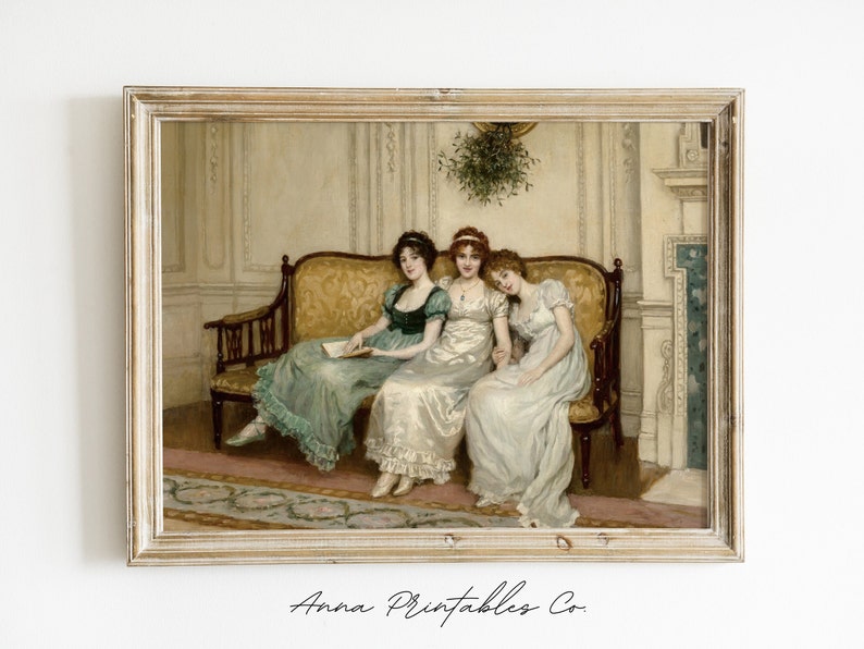 May include: A painting of three women in elegant dresses sitting on a sofa in a room with a fireplace. The women are wearing white and blue dresses and are sitting in a relaxed pose. The painting is set in a room with a fireplace and a window. The painting is framed in a light wood frame.