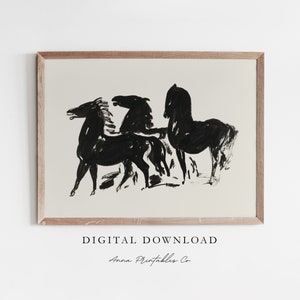 May include: Black and white line art print of three horses in a minimalist style. The print is framed in a light wood frame and has the text "DIGITAL DOWNLOAD" and "Anna Printables Co." below the image.