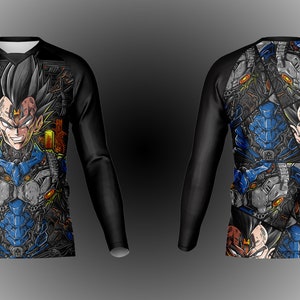 May include: Black long-sleeve shirt with a graphic print of a character with a half-human, half-robot face. The character is surrounded by a pattern of robotic parts and gears.