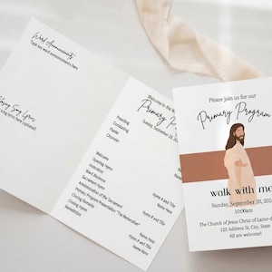 May include: A white folded programme for a Primary Programme event. The front features an illustration of a person with long brown hair, a terracotta horizontal stripe, and the text: Please join us for our Primary Programme, walk with me, September 20, 2026.