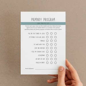 May include: A white sheet of paper with a black and white checklist for a primary program. The checklist includes songs such as "Tell Me the Stories of Jesus" and "I'm Trying to Be Like Jesus".