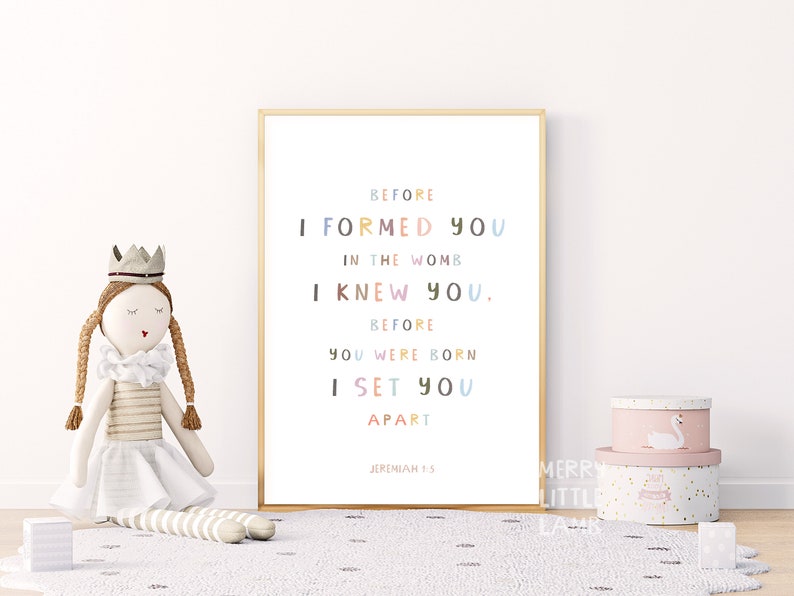 May include: A printable wall art print with a gold frame and a white background. The text reads "Before I formed you in the womb I knew you. Before you were born I set you apart Jeremiah 1:5". The text is in a colorful font.