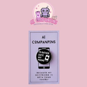 May include: A pin with the text "I'd rather date my phone" on a black circle, with a phone graphic. The pin is on a purple card with the text "AI COMPANPINS" and "BECAUSE MY BOYFRIEND IS BETA THAN YOURS!"
