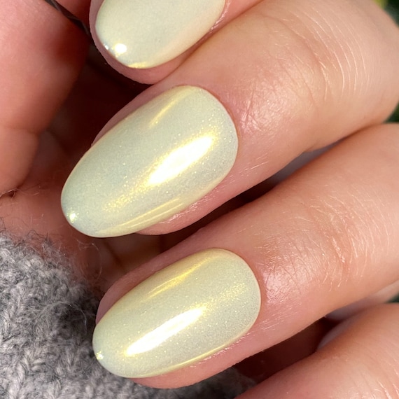 yellow chrome nails