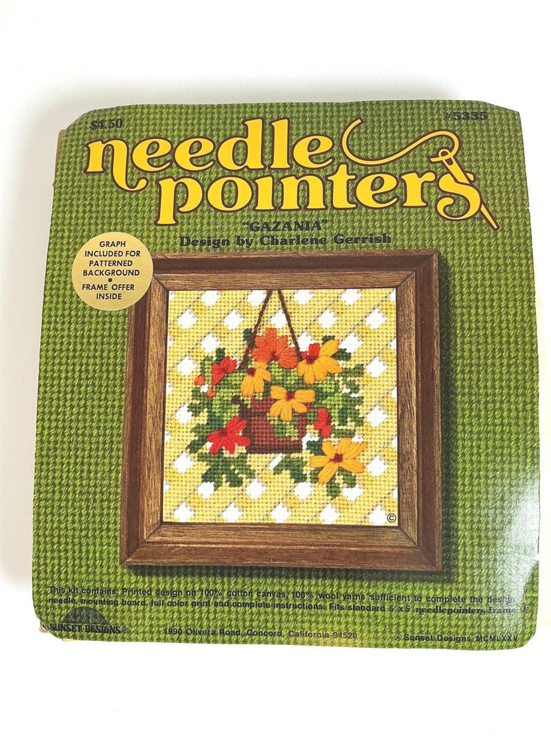 May include: A needlepoint kit titled needle pointers Gazania by Charlene Gerrish. The packaging features a green houndstooth background and a central image of a finished needlepoint of orange and yellow flowers in a hanging basket.
