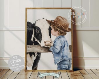 May include: A watercolour painting of a young child wearing a brown cowboy hat and a blue denim jacket, leaning in to kiss a black and white cow on the nose. The cow is standing behind a wooden fence.