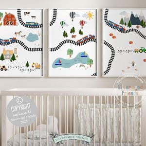 May include: Three printable wall art prints for a nursery or child's room. Each print features a different scene with a train track, a train, and other elements. The first print features a red barn, a horse, and a tractor. The second print features a lake, a boat, and a bear. The third print features mountains, a truck, and a farm.