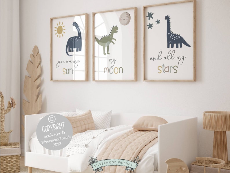 This Set of 3 Dinosaur Nursery Prints, featuring a sun, moon, stars and dinosaurs, along with the loving and positive quote You are my sun, my moon, and all my stars - will create a harmonious and dreamy atmosphere in your nursery.