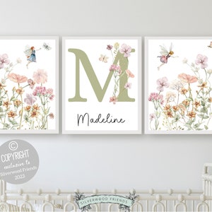 Our gorgeous custom wildflower fairy nursery name prints with watercolor wildflowers, butterfly’s and fairys with a sage green custom name letter, is perfect as a custom nursery print set for your new baby or as a unique baby shower gift.