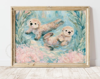 May include: A framed oil painting featuring two light brown sea otters swimming in blue water surrounded by green seaweed and pink coral-like elements. The artwork is enclosed in a light-coloured wooden frame with a visible grain texture.