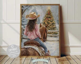 May include: A woman wearing a pink shirt and a brown cowboy hat rides a brown horse through a snowy winter scene. A decorated Christmas tree is in the background.