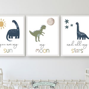 This Set of 3 Dinosaur Nursery Prints, featuring a sun, moon, stars and dinosaurs, along with the loving and positive quote "You are my sun, my moon, and all my stars" will create a harmonious and dreamy atmosphere in your nursery.