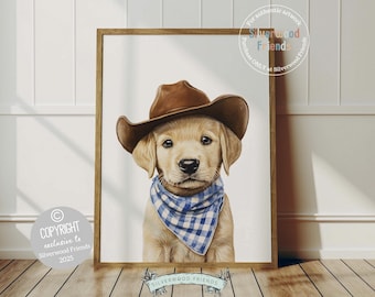 Puede incluir: Impresión enmarcada de un cachorro de golden retriever con un sombrero de vaquero marrón y un pañuelo a cuadros azul y blanco. La obra de arte es exclusiva de Silverwood Friends.