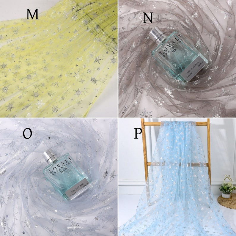 May include: Four swatches of sheer fabric with silver glitter snowflakes. The fabric is in four colors: yellow, gray, light blue, and white. The swatches are labeled M, N, O, and P.