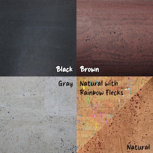 May include: Four cork board samples in different colors: black, brown, gray, and natural with rainbow flecks. The natural cork board has a speckled pattern with colorful flecks.