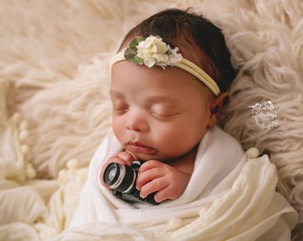 RTS Tiny newborn camera, actually flashes.  Newborn photography prop.