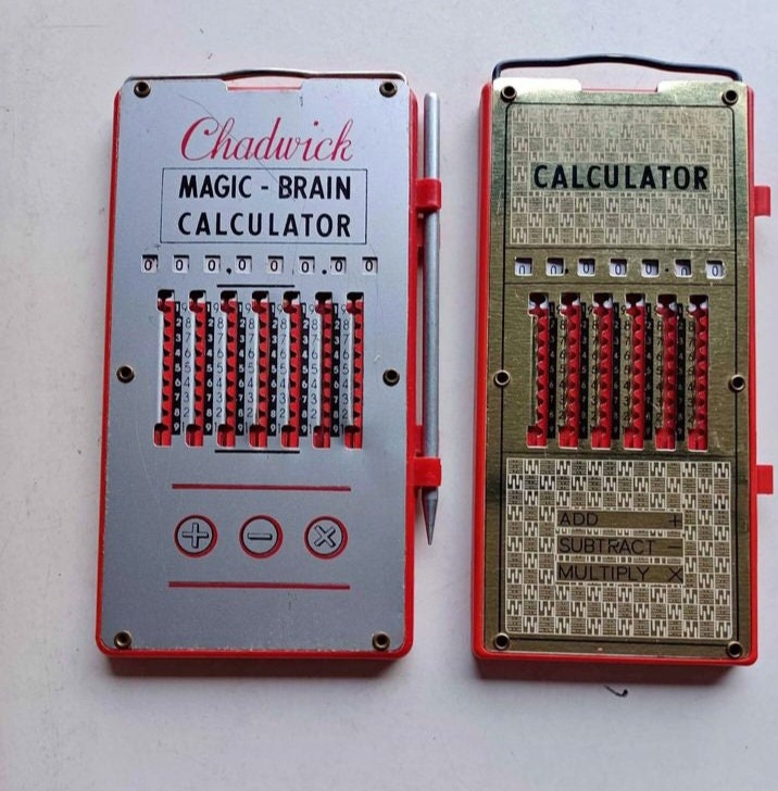 2 Vintage Manual Calculators. 1 is Chadwick Magic-brain Calculator