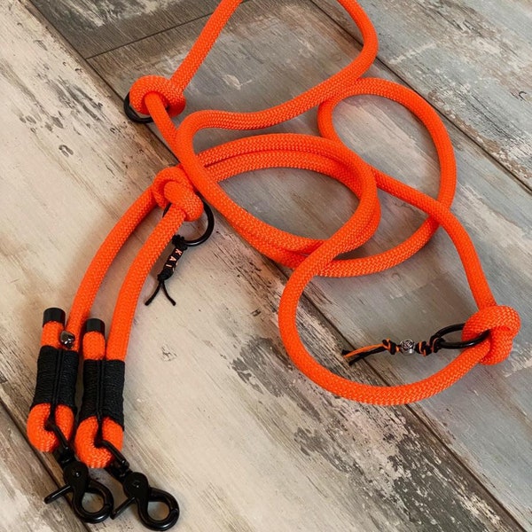 Correa para perros Tauleine naranja neón con accesorios negros