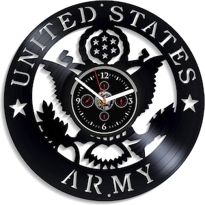 May include: Black vinyl record clock with a white United States Army emblem and a clock face with silver hands and black numbers.