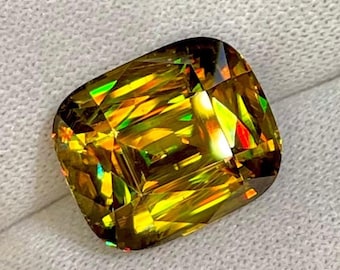 Madagascar Fire Sphene Gemstone: 7.68 Carat Cushion Cut