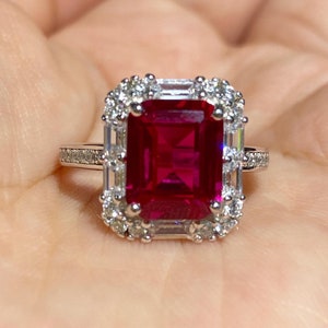 Emerald Cut Ruby Engagement Ring with American Diamond Halo