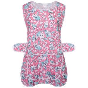 May include: A pink and blue floral print apron with a large pocket and adjustable straps. The apron has a white trim around the edges.