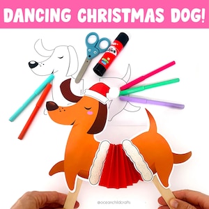 Puede incluir: Una plantilla de artesanía imprimible para un perro de Navidad bailando. La plantilla incluye un perro con un gorro de Papá Noel y una falda roja. La imagen también muestra tijeras, pegamento y rotuladores.