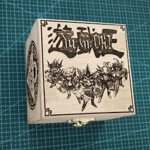 Caja de música electrónica de Yu-Gi-Oh! Duel Monsters / mecanismo de sonido USB recargable / versión de caja de música con canción de juego de anime japonés personalizada