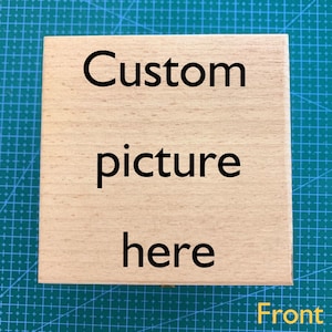May include: A wooden box with the text "Custom picture here" printed on the front. The box is light brown and has a natural wood grain.