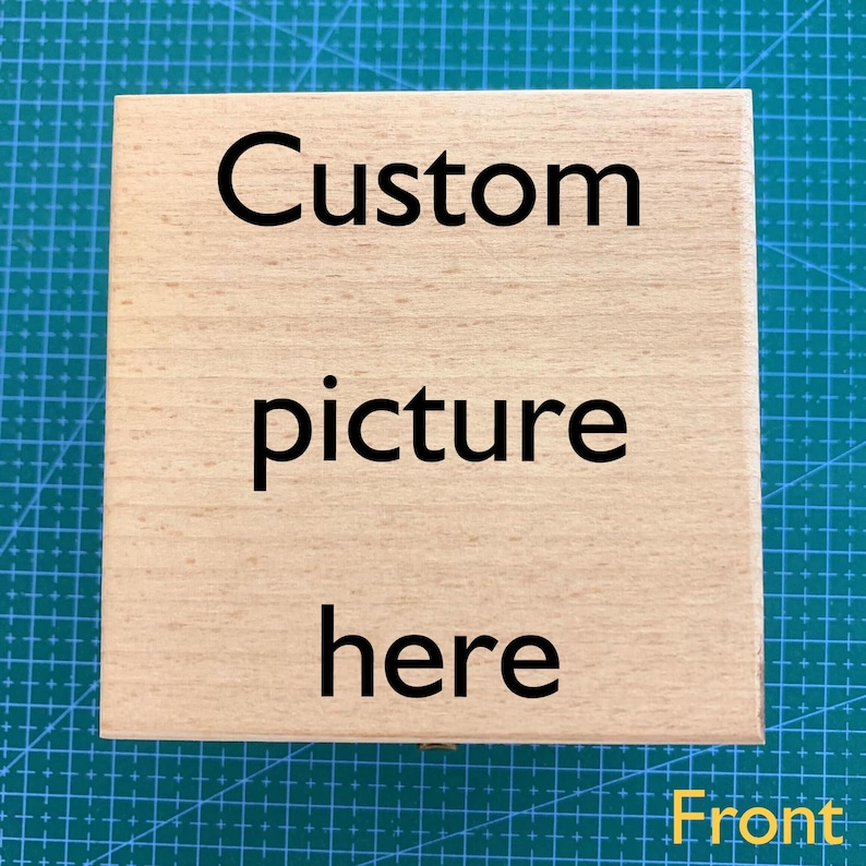 May include: A wooden box with the text "Custom picture here" printed on the front. The box is light brown and has a natural wood grain.