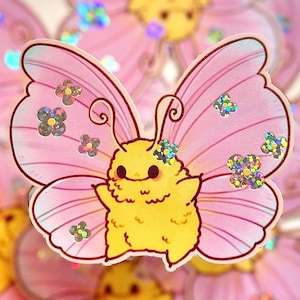 May include: A whimsical sticker featuring a yellow cartoon butterfly with pink wings. The butterfly has a smiling face and is adorned with iridescent flower-shaped accents. The wings have delicate lines, and the overall design is cute and playful.