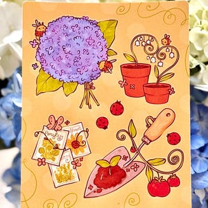 May include: A whimsical illustration featuring gardening elements. It includes a purple hydrangea bouquet, potted plants, seed packets, a trowel with tomatoes, and ladybugs. The artwork is set against a light orange background with decorative swirls.