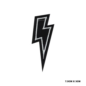 May include: Black and white embroidered lightning bolt patch, 7.5 inches by 3 inches.