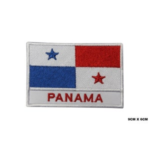 May include: An embroidered patch featuring the flag of Panama. The patch is white with a blue and red flag in the centre. The flag has a white star in the top left corner and a red star in the bottom right corner. The word "PANAMA" is written in red below the flag.
