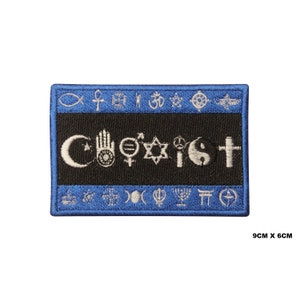 May include: A blue and black embroidered patch with the word "Coexist" in white lettering. The word is surrounded by various religious symbols, including a crescent moon, a hand, a peace sign, a Star of David, a yin-yang symbol, and a cross. The patch is 9 cm by 6 cm.