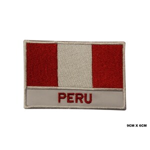 May include: Embroidered patch featuring the flag of Peru. The patch is red, white, and red with the word "PERU" written in red on a white background. The patch measures 9 cm by 6 cm.