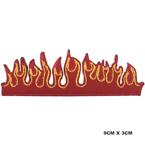 May include: Red and yellow embroidered iron-on patch of flames. The patch is 9 cm by 3 cm.