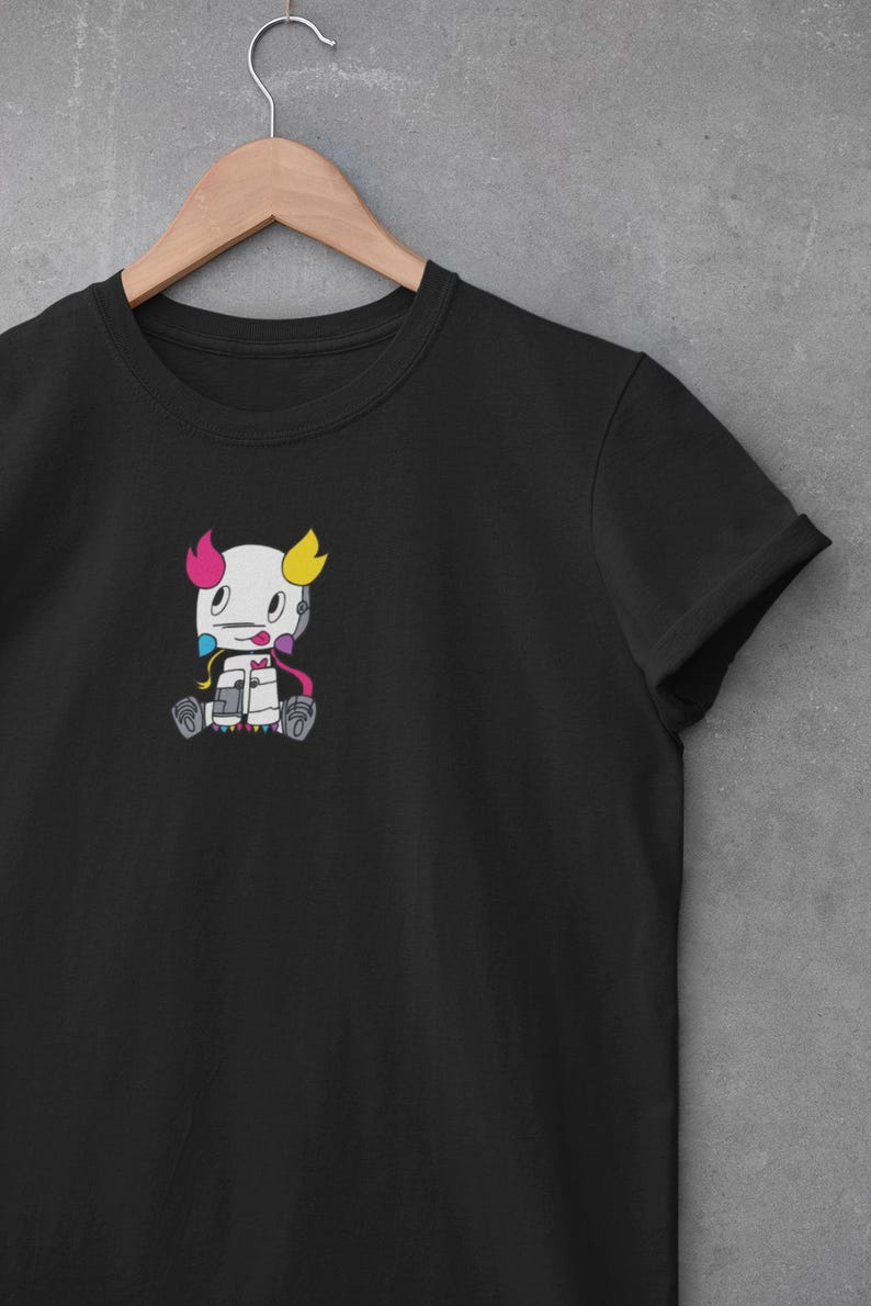 May include: Black t-shirt with a small, colorful cartoon robot embroidered on the front.
