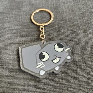Pebble Dandys World Roblox Keychain