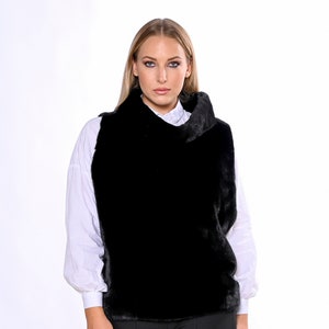 MINK FUR VEST,Saga furs auction  mink vest in black colour,an impressive fur for specials looks , cozy and elegant.