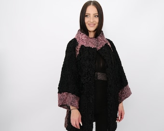 Astrakhan jacket.Elegant astrakhan jacket made from auctioned fur from Saga Furs in black and pink color.