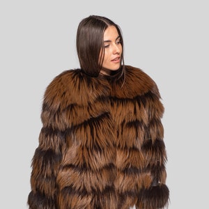 Modern fox fur jacket in color brown, elegant and cozy jcoat special for your winter holidays.