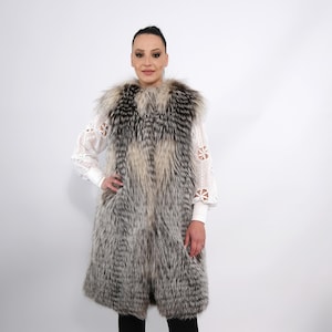 FOX FUR VEST.Elongated vest in cross nafa furs auction Scandinavian fox fur. Features of this model: straight silhouette